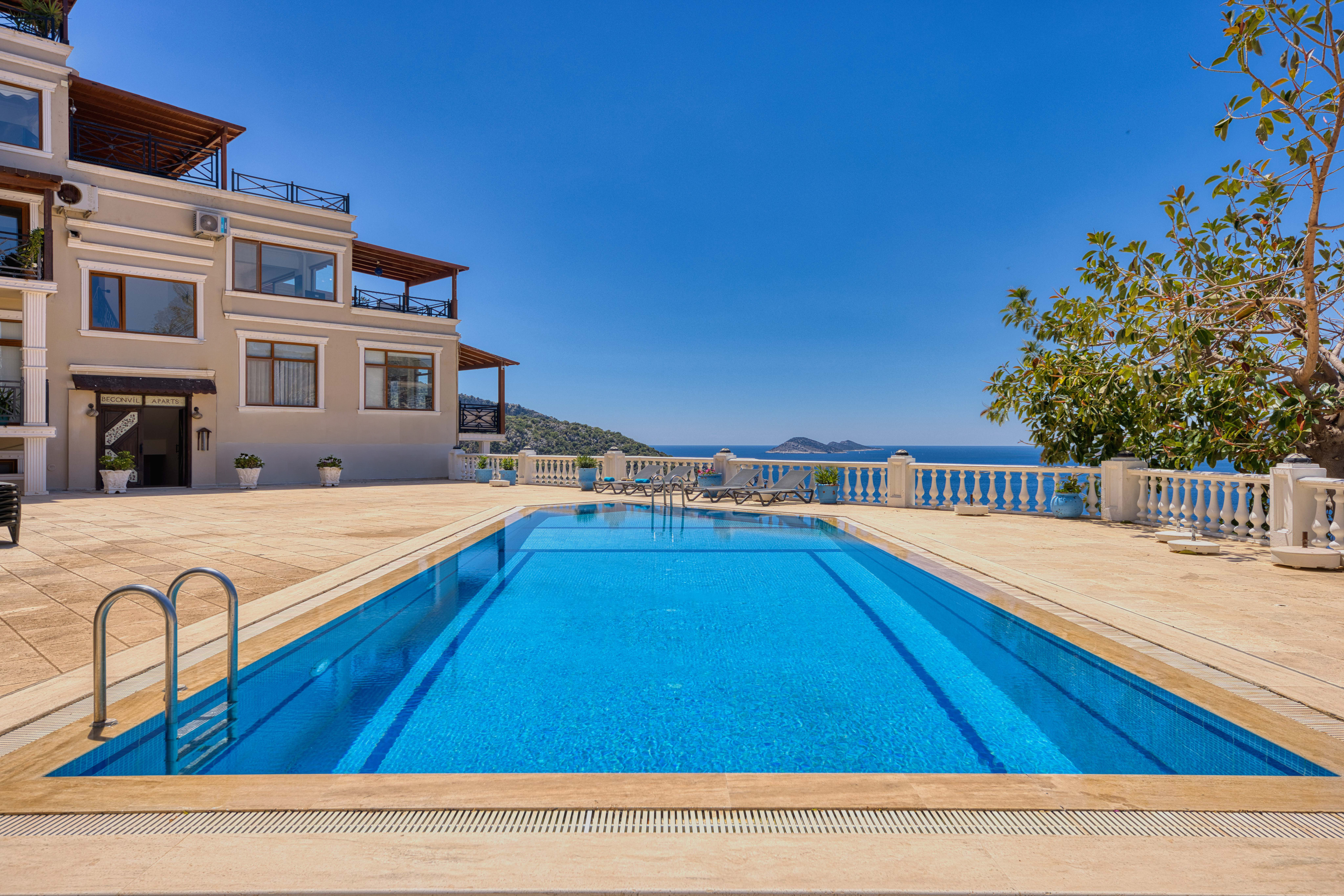 Shared pool which is a great length for swimming or relaxing.